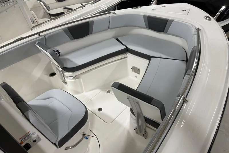 Slide: The Image of 2025 Robalo R232 Explorer boat interior with sleek seating and modern design. - 10