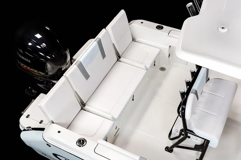 Slide: The Image of Manufacturer Provided Image: 2025 Robalo R232 Explorer boat interior with Yamaha engine, featuring white seating and sleek design. - 22