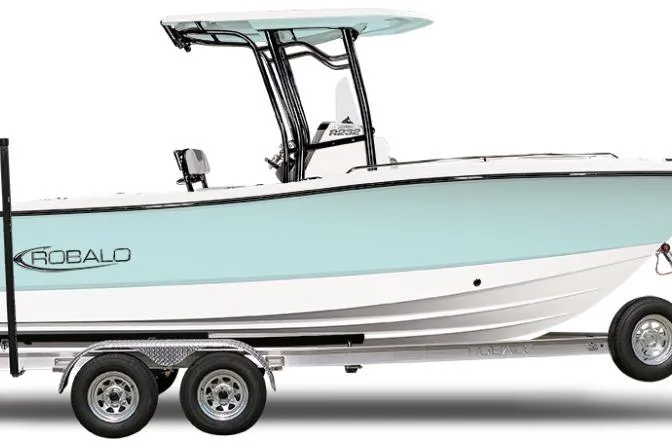 Slide: The Image of 2025 Robalo R232 Explorer boat on trailer, side view, light blue hull. - 3