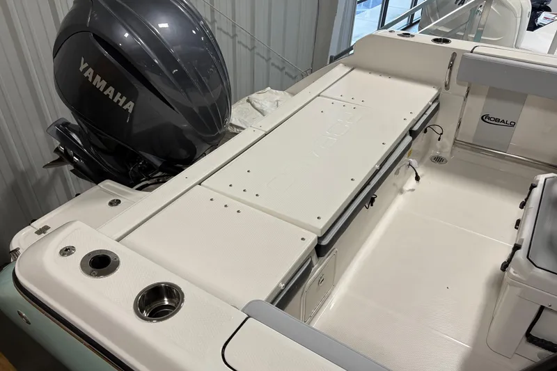 Slide: The Image of 2025 Robalo R232 Explorer boat with Yamaha engine, featuring spacious deck and storage. - 5