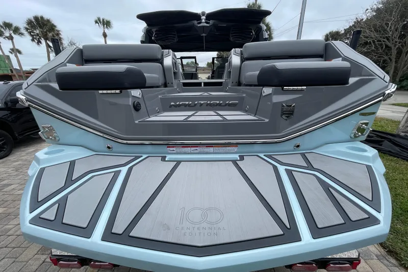 Slide: The Image of 2025 Nautique Super Air Nautique G23 Paragon boat, rear view, centennial edition. - 11
