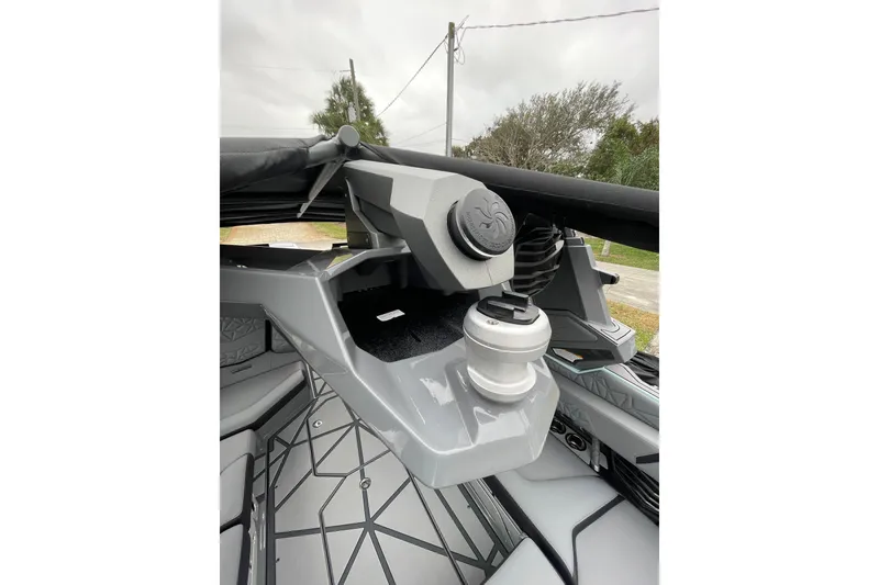 Slide: The Image of 2025 Nautique Super Air Nautique G23 Paragon interior with modern design and storage features. - 15