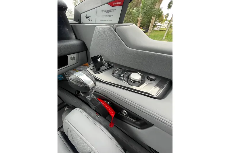 Slide: The Image of 2025 Nautique Super Air Nautique G23 Paragon cockpit controls, featuring sleek design and advanced technology. - 23