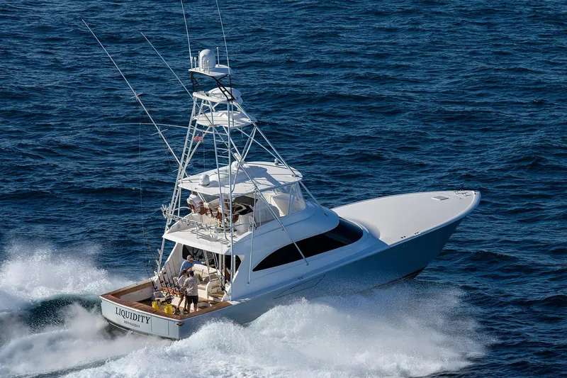 Slide: The Image of Luxurious interior of 2015 Viking 62 Convertible yacht with twin beds and ensuite bathroom. - 54