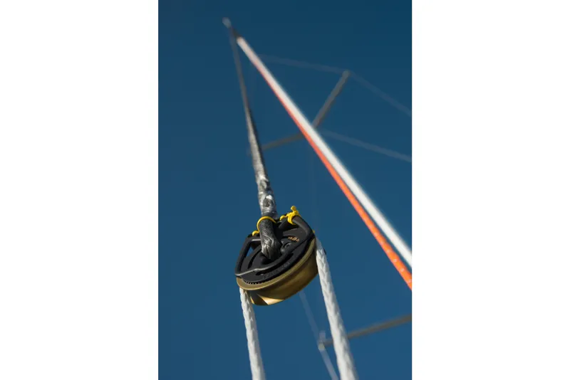 Slide: The Image of Italia Yachts 9.98 (2026) sailboat rigging against clear blue sky. - 14
