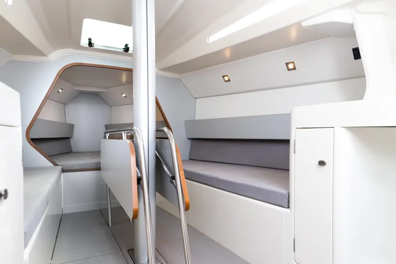 Slide: The Image of Italia Yachts 9.98 (2026) interior cabin with modern design and comfortable seating. - 19