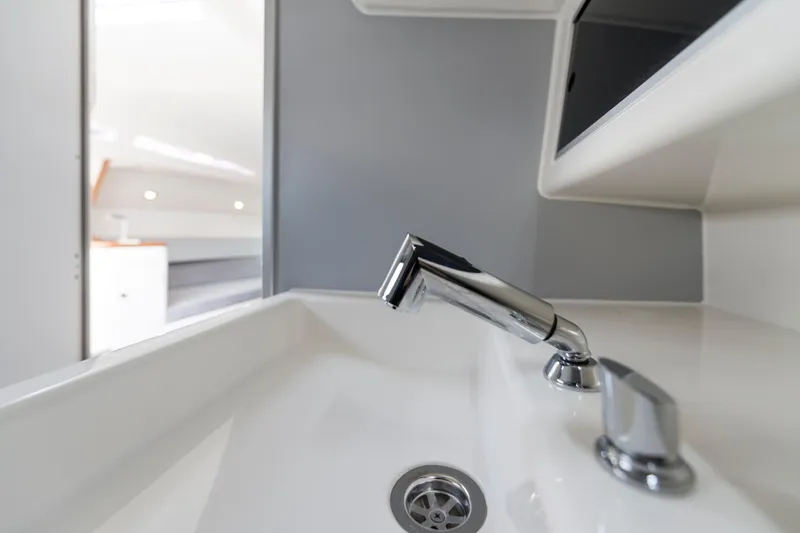 Slide: The Image of Italia Yachts 9.98 (2026) interior sink with modern chrome faucet. - 25