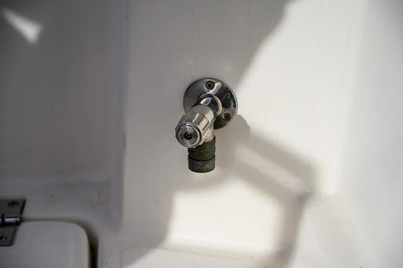 Slide: The Image of 2012 Aspen C90 boat docked with anchor and chain visible. - 18