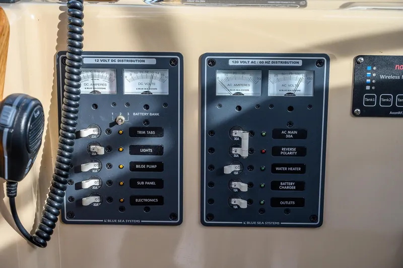 Slide: The Image of 2012 Aspen C90 solar charge controller display showing 13.28 volts, Blue Sky Energy model. - 29