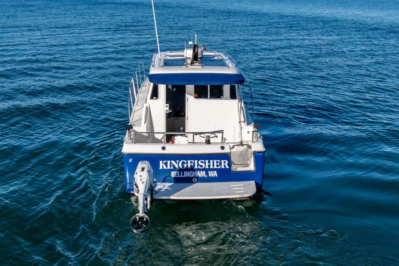 Slide: The Image of Aerial view of 2012 Aspen C90 boat on green water. - 5