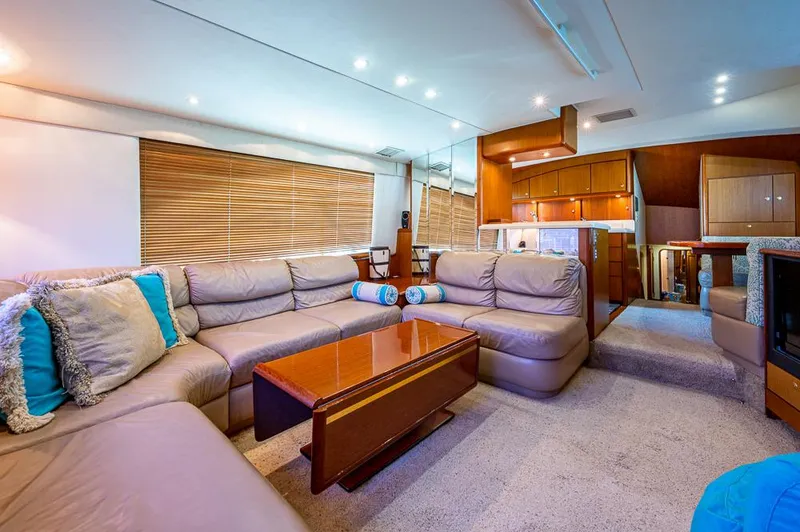 Slide: The Image of Luxurious interior of 1999 Ocean Yachts 60 Convertible with plush seating and modern amenities. - 17