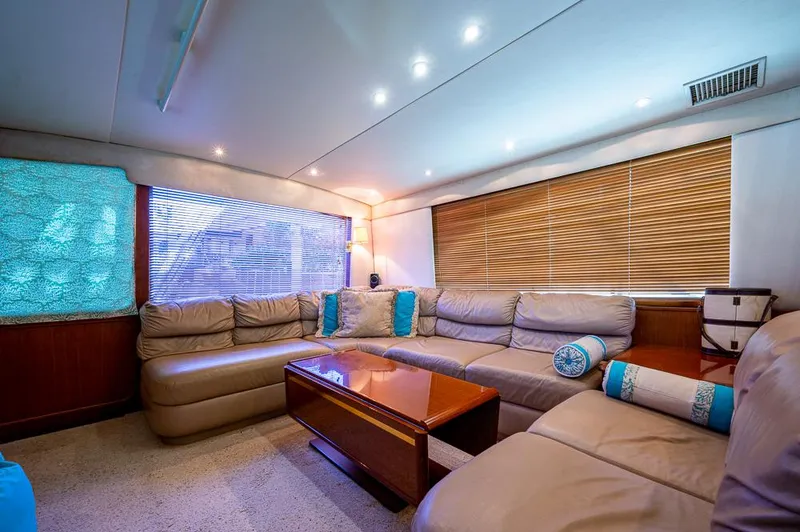 Slide: The Image of Luxurious interior of 1999 Ocean Yachts 60 Convertible with plush seating and elegant decor. - 2