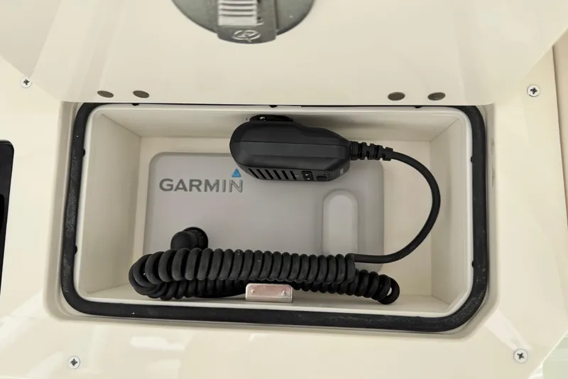 Slide: The Image of Garmin device in Sailfish 272 CC boat compartment, 2026 model. - 23