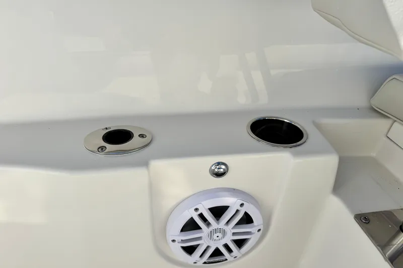 Slide: The Image of 2026 Sailfish 272 CC boat interior with speaker and cup holders. - 31