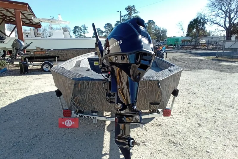 Slide: The Image of 2026 Alweld 1552 Invader boat with Tohatsu outboard motor on trailer. - 10