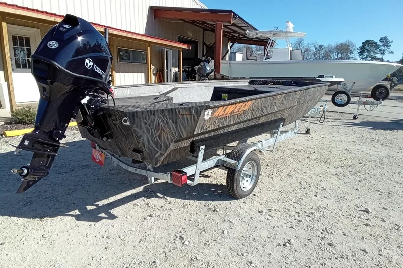 Slide: The Image of 2026 Alweld 1552 Invader boat with Tohatsu motor on trailer. - 12