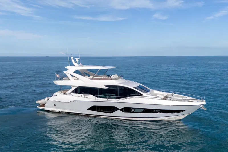 The Image of 2019 Sunseeker 76 Yacht cruising on open sea. - 0