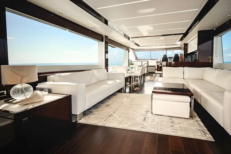 Slide: The Image of Luxurious interior of 2019 Sunseeker 76 Yacht with elegant white seating and ocean view. - 29