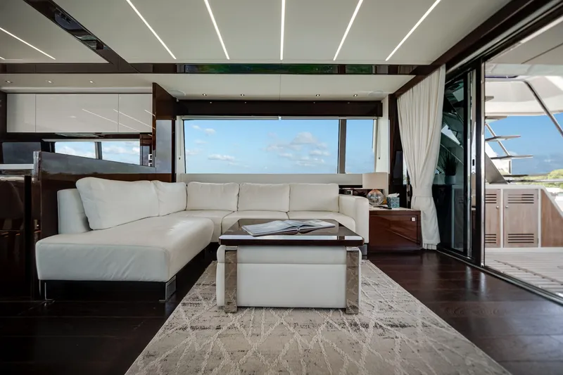 Slide: The Image of Luxurious interior of 2019 Sunseeker 76 Yacht with white leather seating and ocean view. - 30