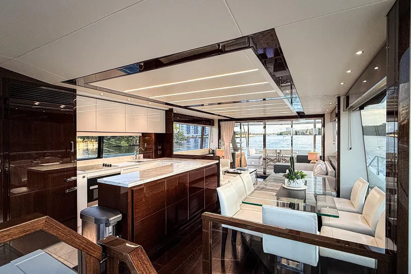 Slide: The Image of Luxurious interior of 2019 Sunseeker 76 Yacht with modern kitchen and dining area. - 33