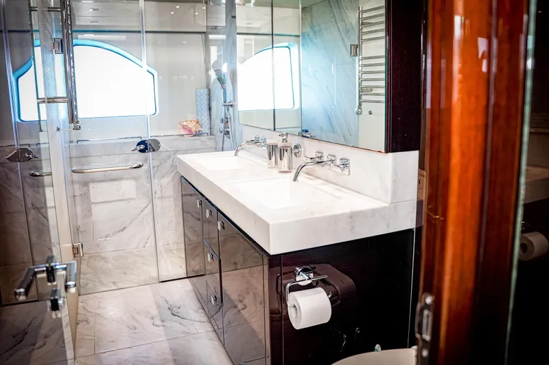 Slide: The Image of Luxurious bathroom interior of 2019 Sunseeker 76 Yacht with marble finishes and modern fixtures. - 40