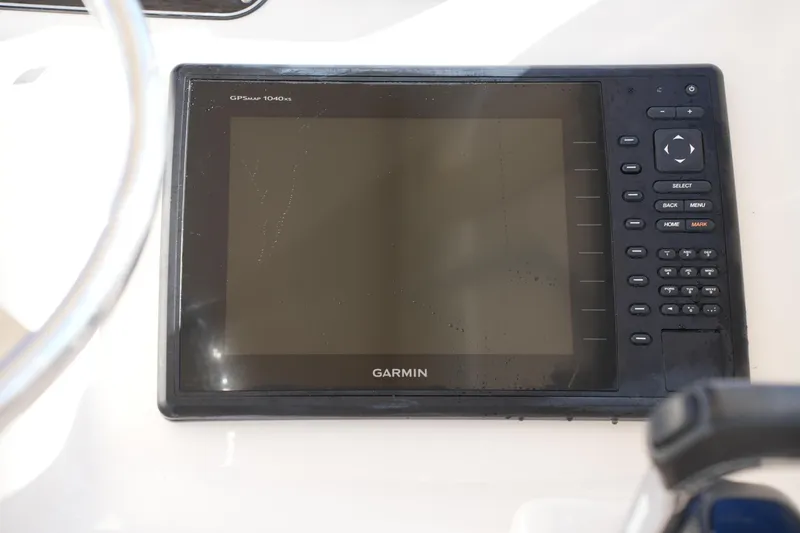 Slide: The Image of Garmin GPSMAP 1040xs on 2016 Grady-White Freedom 255 boat dashboard. - 29