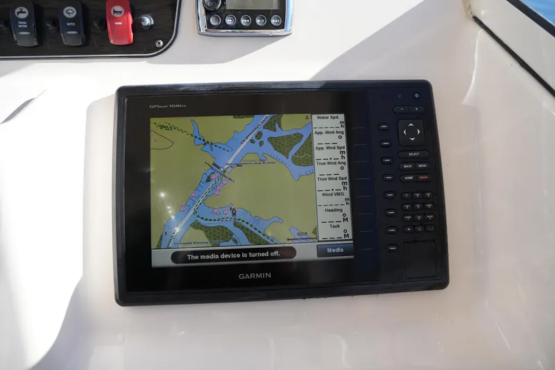 Slide: The Image of Garmin GPS display on 2016 Grady-White Freedom 255 boat dashboard. - 34
