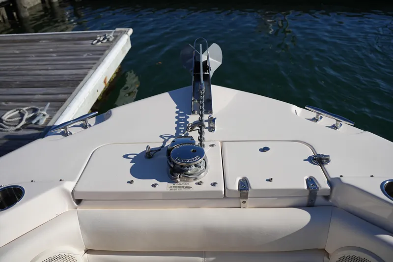 Slide: The Image of Bow of 2016 Grady-White Freedom 255 boat docked by the water. - 41