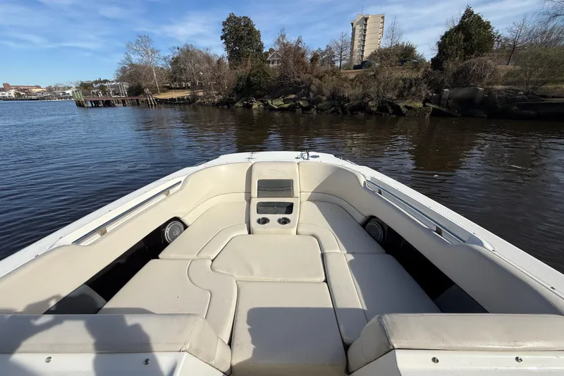 Slide: The Image of 2014 Boston Whaler 270 Vantage boat interior with waterfront view. - 21