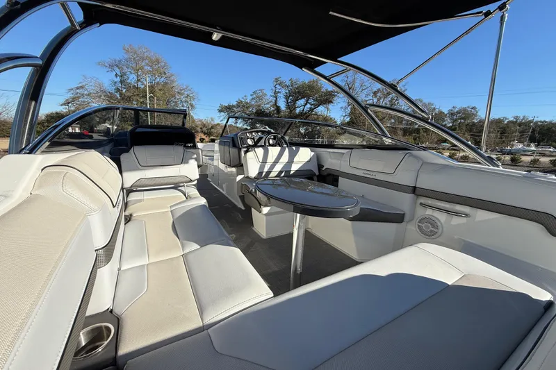 Slide: The Image of 2019 Formula 270 Bowrider interior with spacious seating and sleek design. - 11