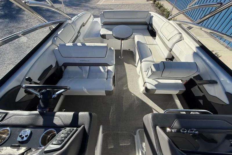 Slide: The Image of 2019 Formula 270 Bowrider interior with luxurious seating and modern steering console. - 15