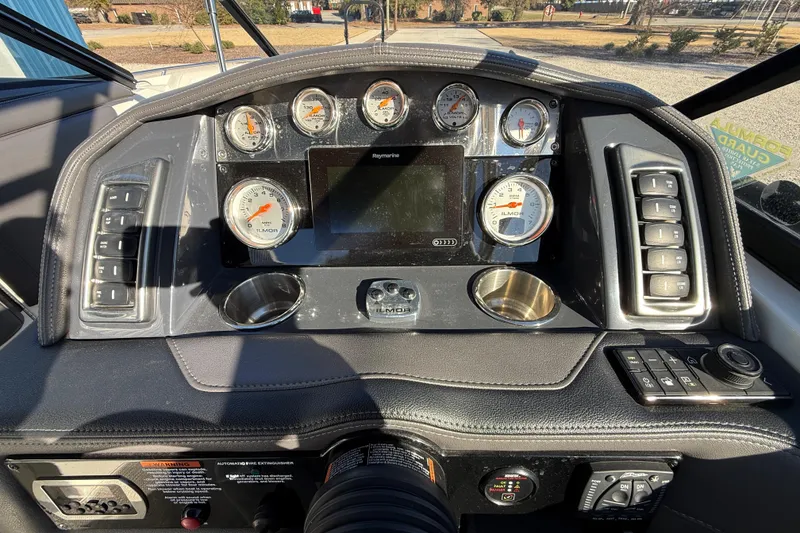 Slide: The Image of Dashboard of a 2019 Formula 270 Bowrider boat with gauges and controls. - 18