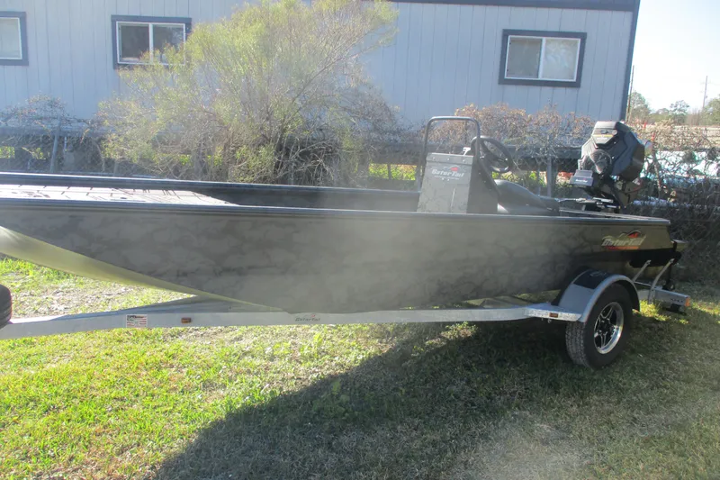 Slide: The Image of 2026 Gator Tail 1860 Extreme boat on trailer, outdoors in grassy area. - 5