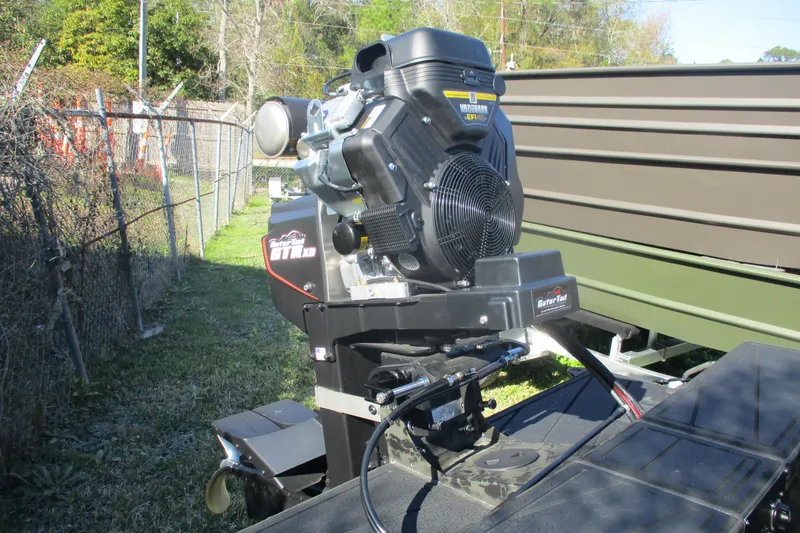 Slide: The Image of 2026 Gator Tail 1860 Extreme boat motor, outdoor setting, showcasing powerful engine design. - 7