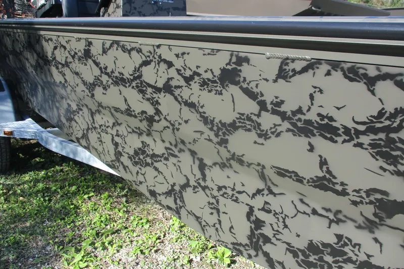 Slide: The Image of 2026 Gator Tail 1860 Extreme boat with camouflage pattern on trailer. - 8