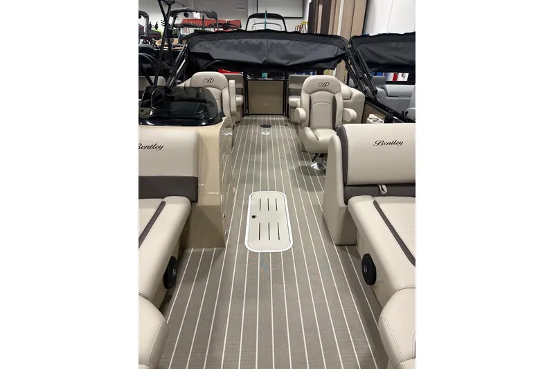 Slide: The Image of 2026 Bentley Pontoons Legacy 223 Navigator interior with luxurious seating and modern design. - 11