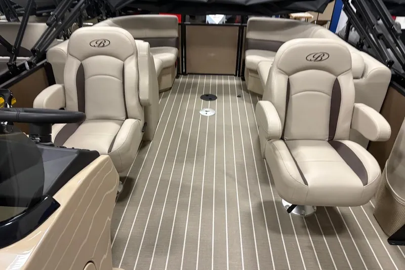 Slide: The Image of 2026 Bentley Pontoons Legacy 223 Navigator interior with luxurious seating and modern design. - 12