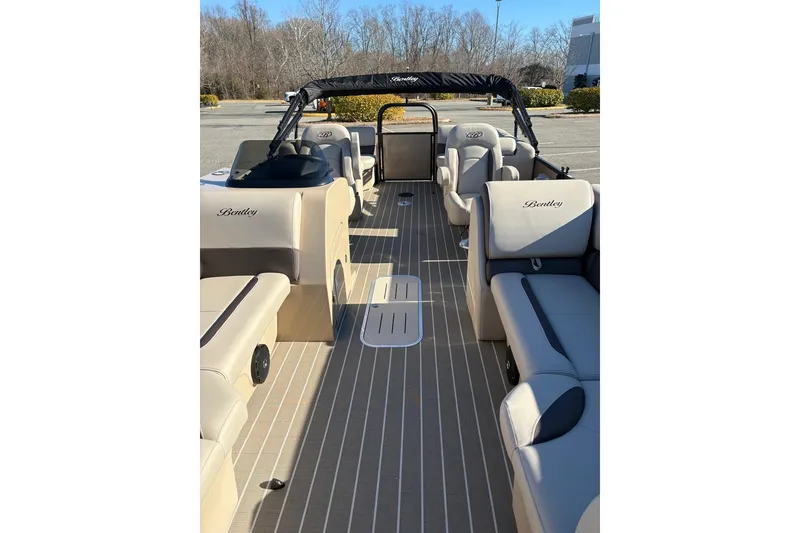 Slide: The Image of 2026 Bentley Pontoons Legacy 223 Navigator interior with luxurious seating and sleek design. - 8