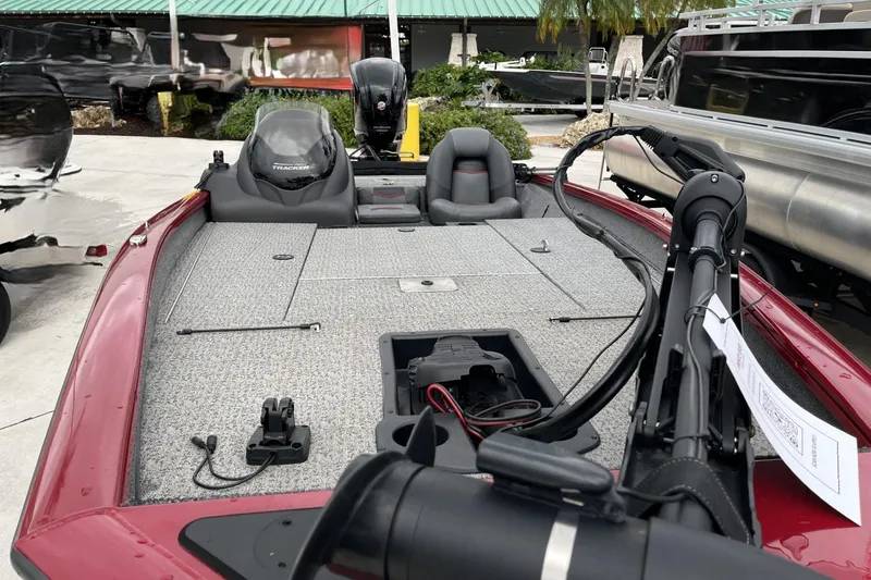 Slide: The Image of 2024 Tracker Pro Team 190 boat with spacious deck and modern features. - 3
