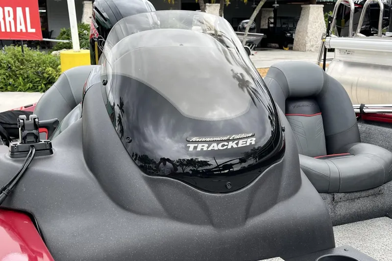 Slide: The Image of 2024 Tracker Pro Team 190 boat with sleek windshield and comfortable seating. - 7