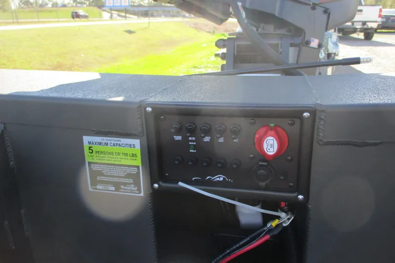 Slide: The Image of Control panel of 2026 Gator Tail 1860 Extreme boat with capacity label. - 4