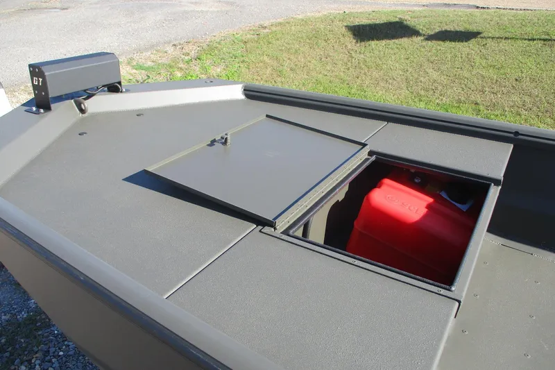 Slide: The Image of 2026 Gator Tail 1860 Extreme boat with open storage compartment and red fuel tank. - 7