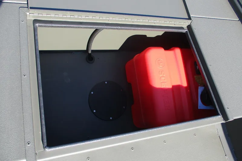 Slide: The Image of Open storage compartment in 2026 Gator Tail 1860 Extreme boat with red fuel tank. - 8