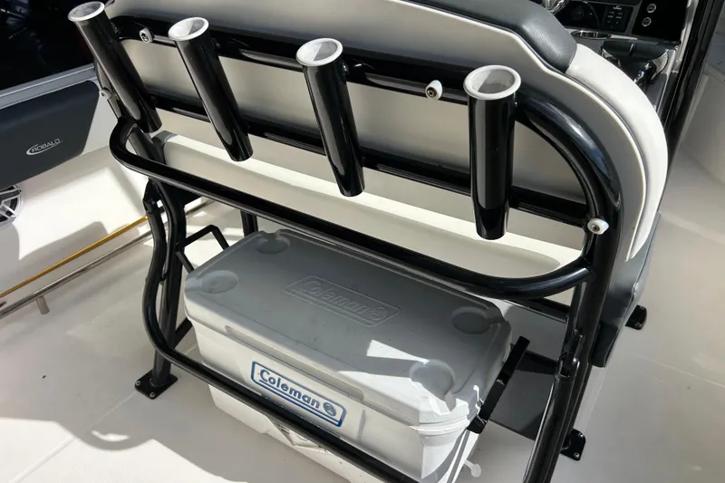 Slide: The Image of 2023 Robalo R242 Center Console boat in storage facility with Yamaha engines. - 4