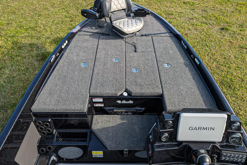 Slide: The Image of 2026 Bass Cat Eyra SP boat deck with Garmin system, featuring spacious seating and storage. - 10