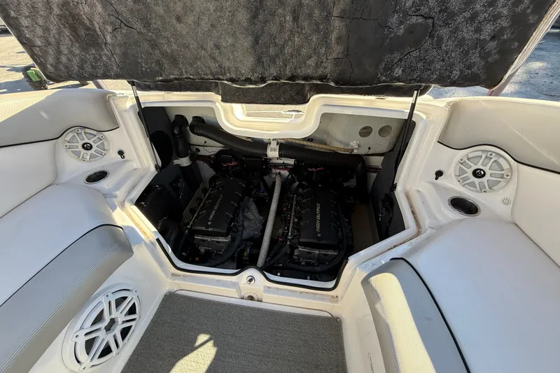 Slide: The Image of 2011 Yamaha Boats AR240 HO engine compartment with dual high-output engines. - 10