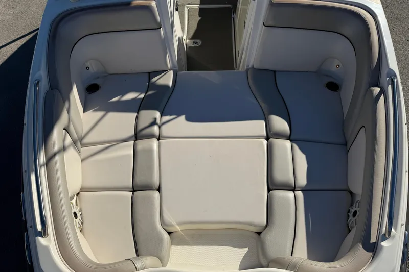 Slide: The Image of 2011 Yamaha Boats AR240 HO interior seating, featuring spacious and comfortable cushioned layout. - 13