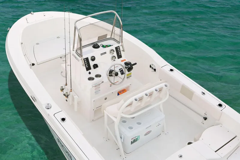 Slide: The Image of Manufacturer Provided Image: 2016 Robalo R180 Center Console boat on clear water. - 10