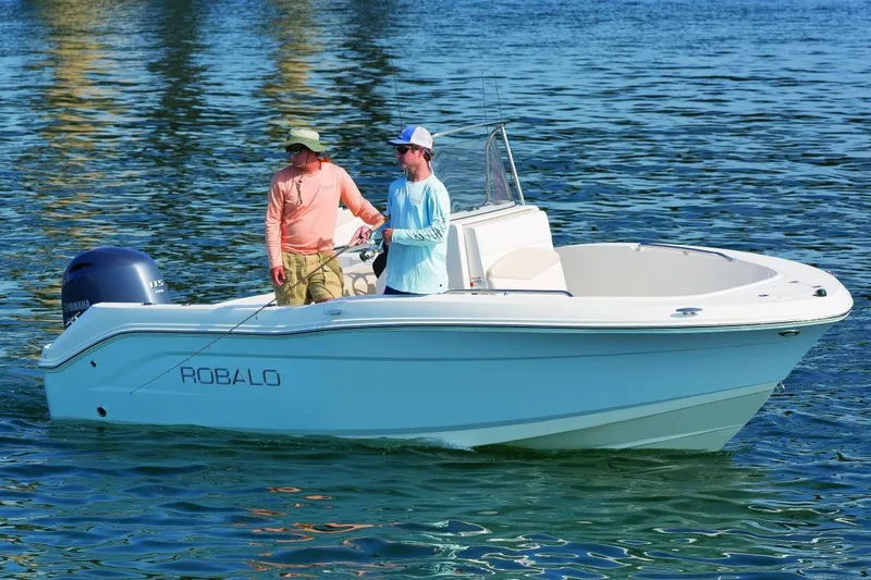 Slide: The Image of Manufacturer Provided Image: 2016 Robalo R180 Center Console boat on water with two people fishing. - 6