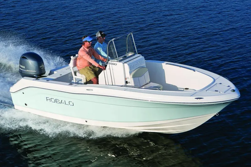 Slide: The Image of Manufacturer Provided Image: 2016 Robalo R180 Center Console boat cruising on water. - 7